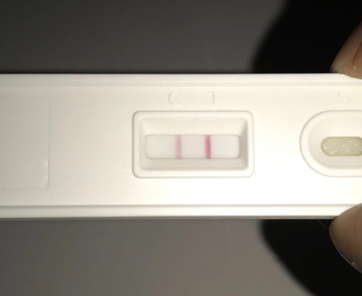 移植11天验孕试纸图较浅